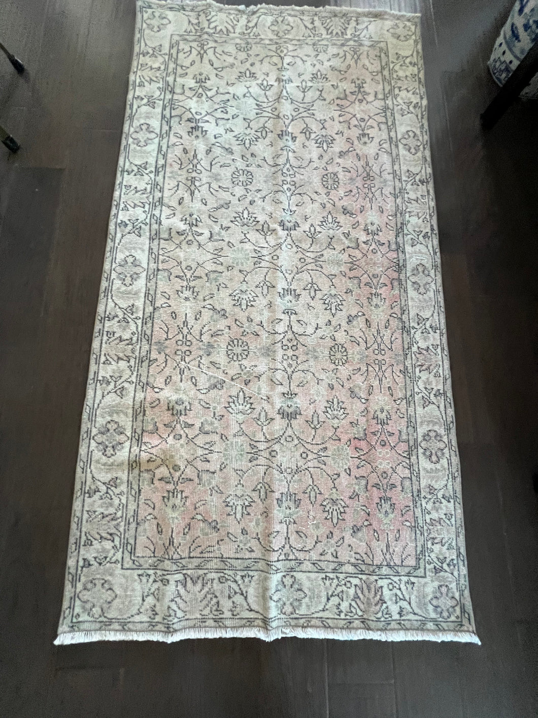 Vintage Turkish Ivory and Peach Faded Accent Rug