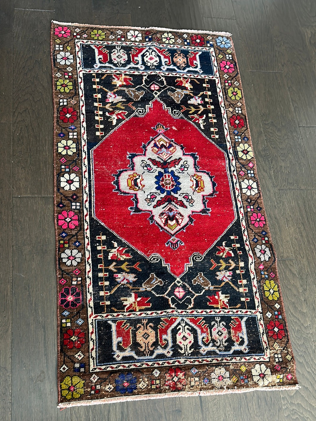 Vintage Turkish Red and Black Accent Floral Rug